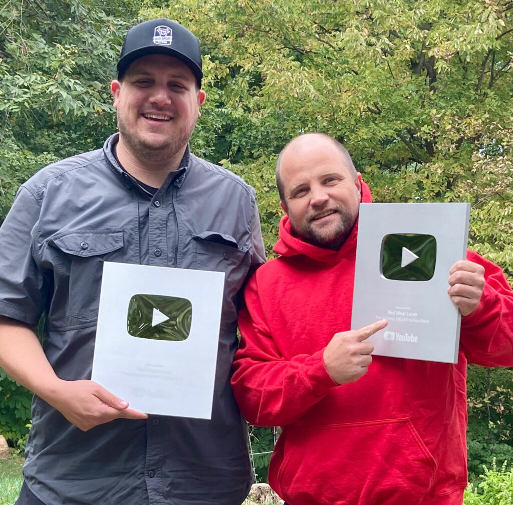 Streamlining Video Production For LMS and Social Media with this proven method. Bear Wade and Joey Brisket holding YouTube Silver Play Button Award
